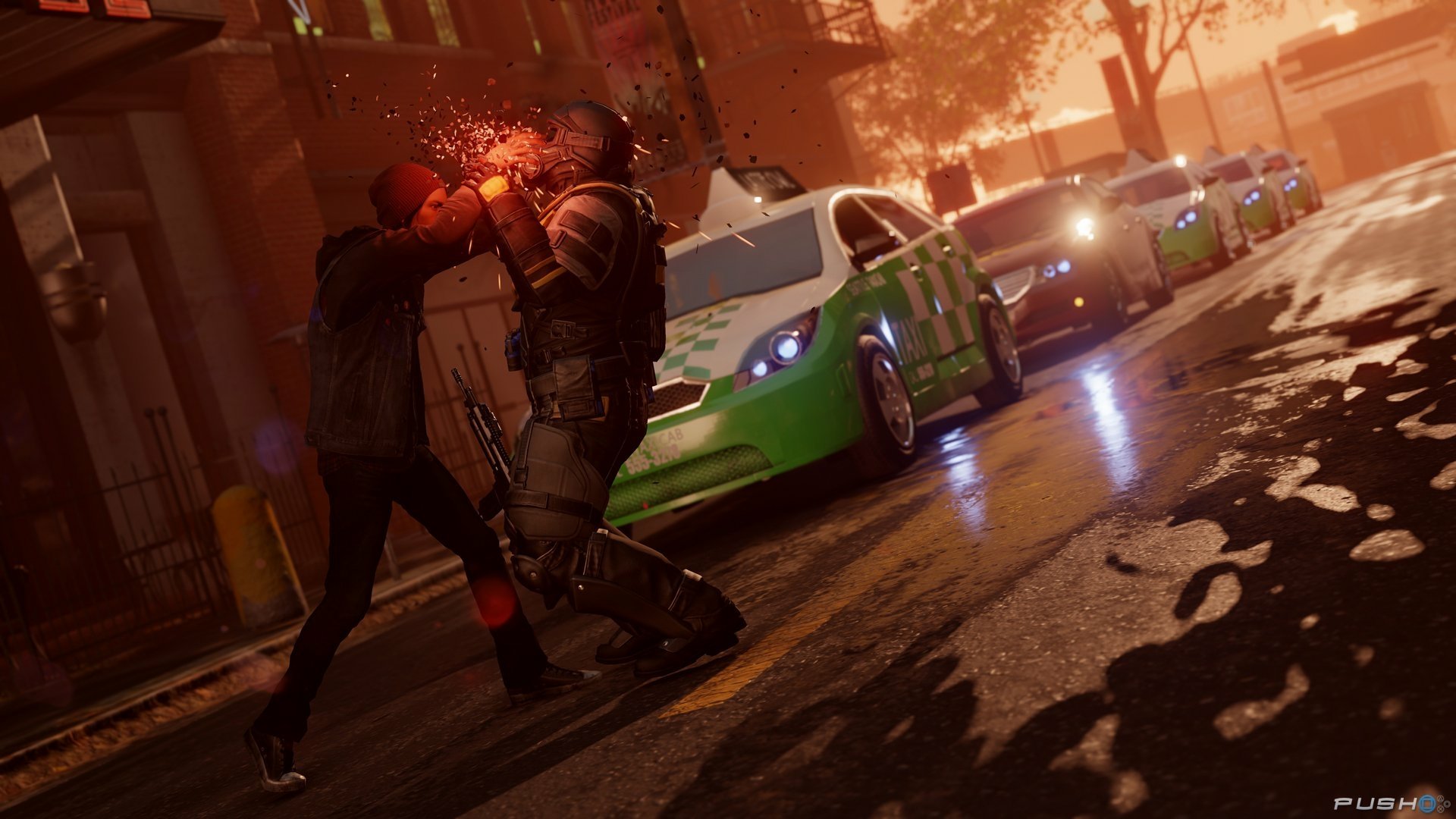 HD wallpaper of inFAMOUS: Second Son featuring a character using powers against an enemy on a city street at dusk.