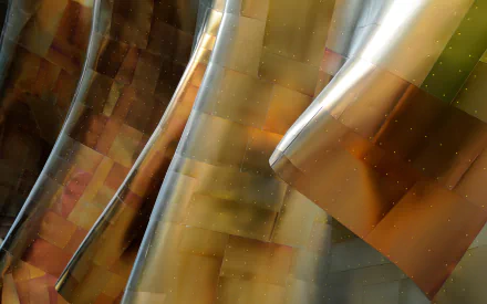 HD PC desktop wallpaper featuring close-up details of reflective, curved metallic architecture with warm bronze and silver tones.