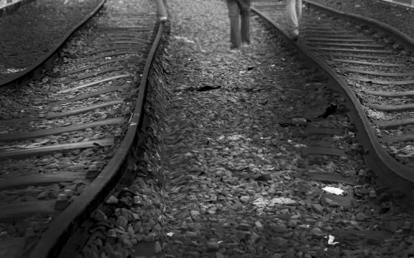 Black and white 4K Ultra HD wallpaper featuring manipulated abandoned train tracks with a mysterious, empty atmosphere.