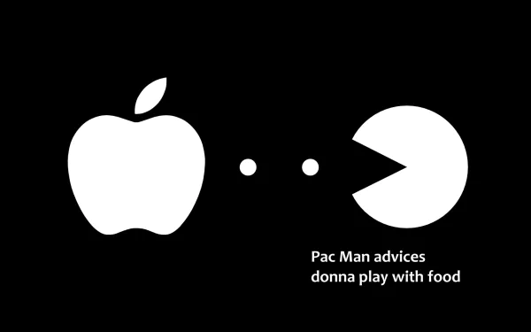 Funny HD PC desktop wallpaper featuring a Pac-Man character chasing two dots after an apple, humorously captioned with gaming advice about food.