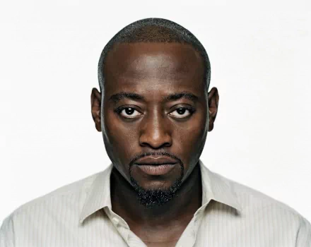 HD desktop wallpaper featuring a close-up portrait of Omar Epps, known for his role in the TV show House.
