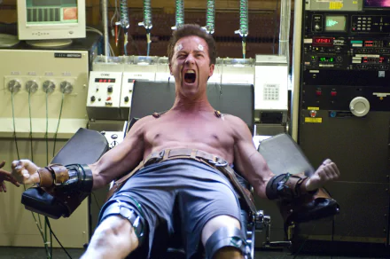 Edward Norton as Bruce Banner in a dramatic scene from The Incredible Hulk, showcasing intense emotion inside a laboratory setting. HD wallpaper capturing a pivotal moment.