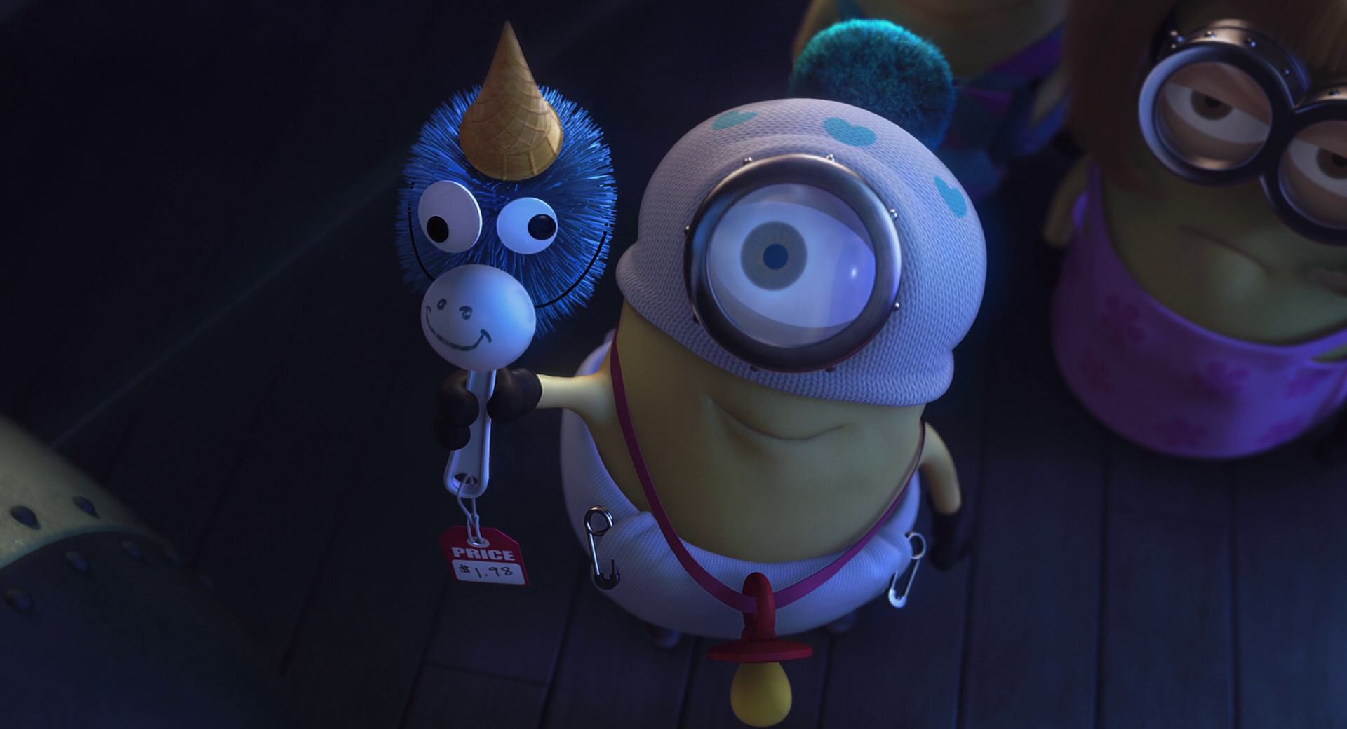 HD PC desktop wallpaper featuring a Minion from the Despicable Me movie holding a blue balloon animal in a dark setting.