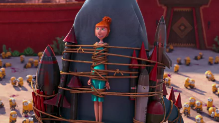 HD desktop wallpaper featuring Lucy from Despicable Me 2 tied to a rocket, surrounded by Minions from the Despicable Me movie series.