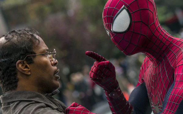 HD wallpaper from The Amazing Spider-Man 2 featuring Spider-Man and Jamie Foxx as Max Dillon in a confrontational stance.