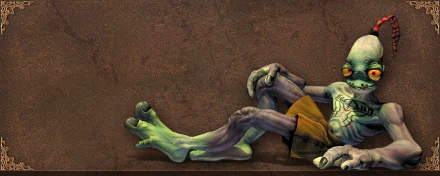 HD PC desktop wallpaper from the video game Oddworld: a reclining green Mudokon with long limbs and tattered shorts against a textured brown background.