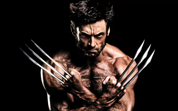 Hugh Jackman as Wolverine, showcasing fierce determination with extended claws, set against a dramatic black background. An engaging HD wallpaper for fans of The Wolverine movie.