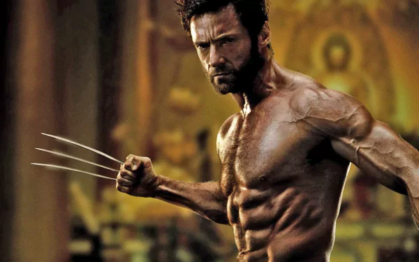 HD PC desktop wallpaper featuring a muscular Wolverine character from the movie The Wolverine, poised in a battle-ready stance with claws extended.