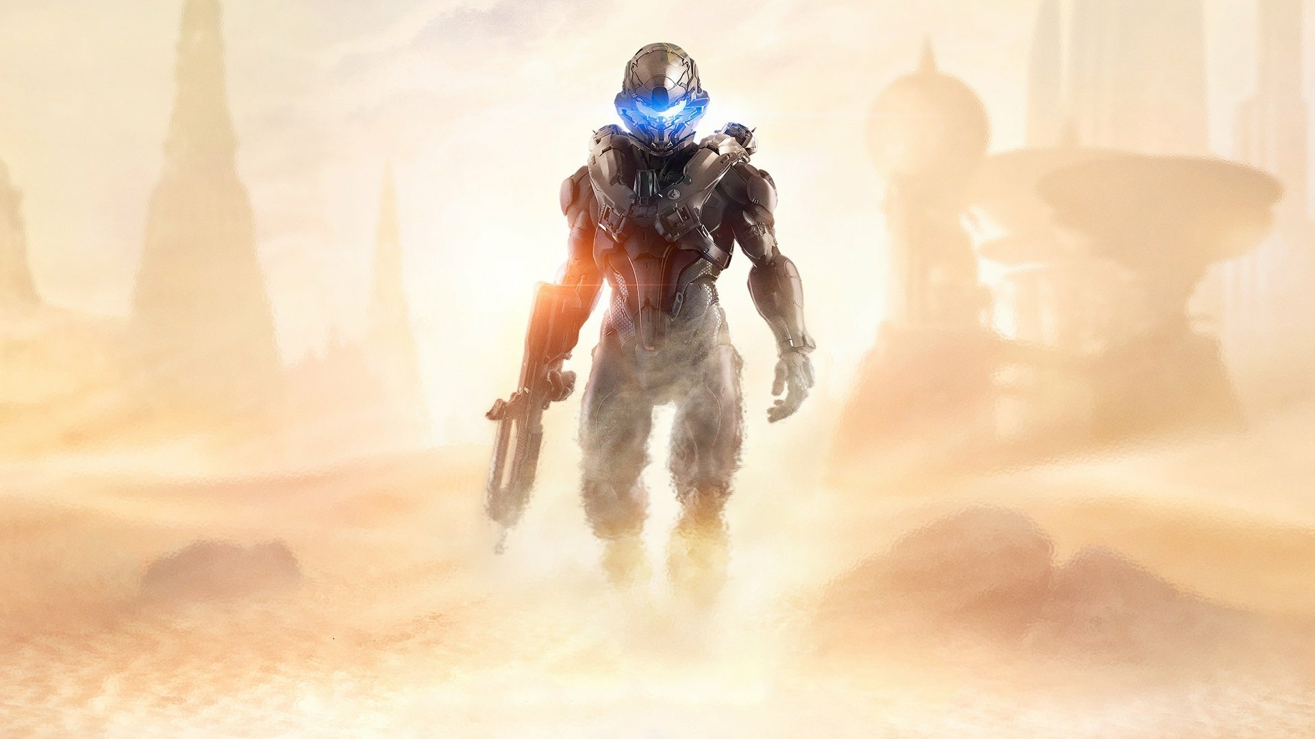 A powerful character from Halo 5: Guardians stands confidently in a misty landscape, showcasing a dynamic HD desktop wallpaper with a futuristic vibe.