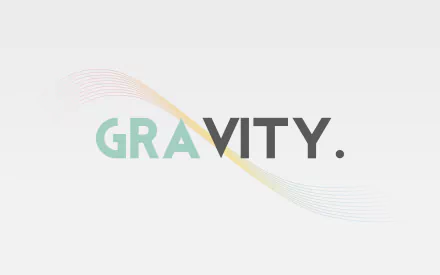 Minimalist HD PC desktop wallpaper featuring the word GRAVITY with a subtle, flowing wave design in soft pastel tones.