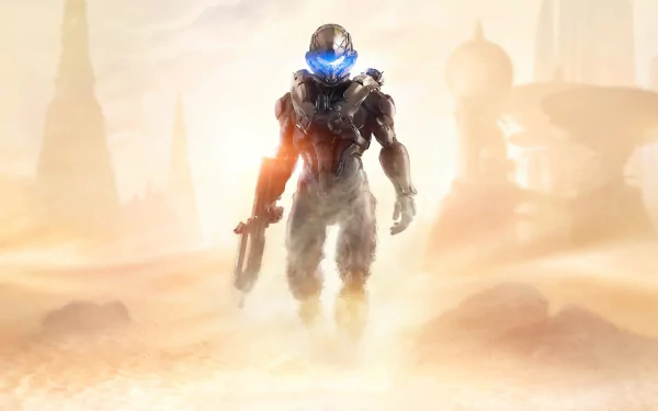 A powerful character from Halo 5: Guardians stands confidently in a misty landscape, showcasing a dynamic HD desktop wallpaper with a futuristic vibe.