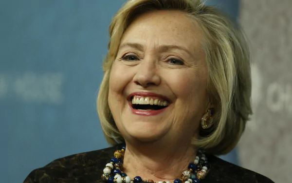 HD desktop wallpaper of Hillary Rodham Clinton smiling.
