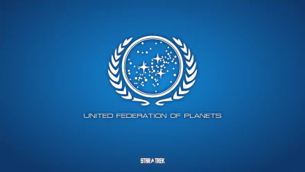 HD PC desktop wallpaper featuring the United Federation of Planets emblem from Star Trek, set against a clean blue background in a classic sci-fi style.