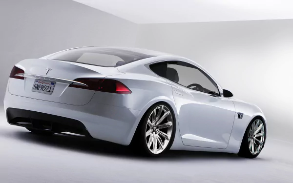 HD desktop wallpaper of a sleek Tesla car on a clean background, emphasizing luxury and innovation.