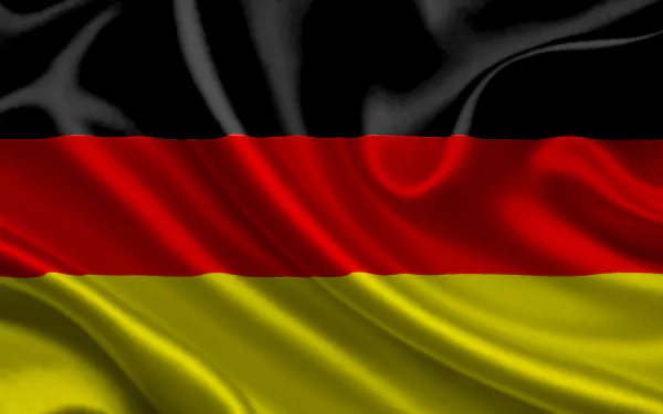 A high-definition desktop wallpaper featuring the German flag, displaying bold black, red, and yellow stripes against a silky, flowing background.