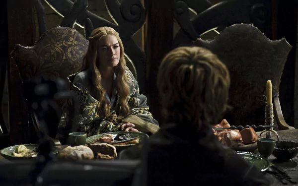 HD desktop wallpaper featuring Lena Headey as Cersei Lannister from the TV show Game of Thrones, seated at a dimly lit banquet table.