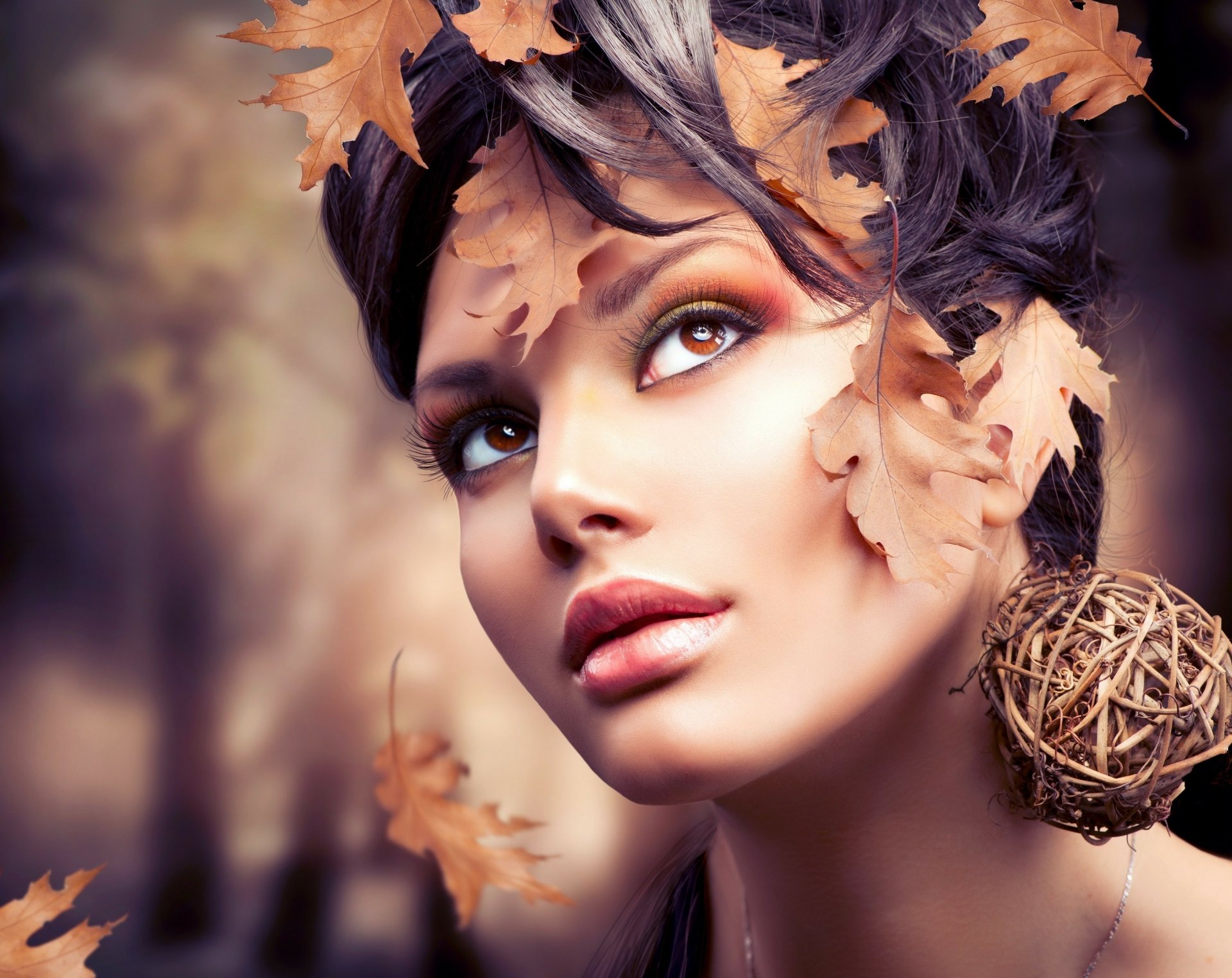 HD PC desktop wallpaper featuring a close-up of woman Judy Wilkins adorned with autumn leaves and a natural, artistic headpiece.