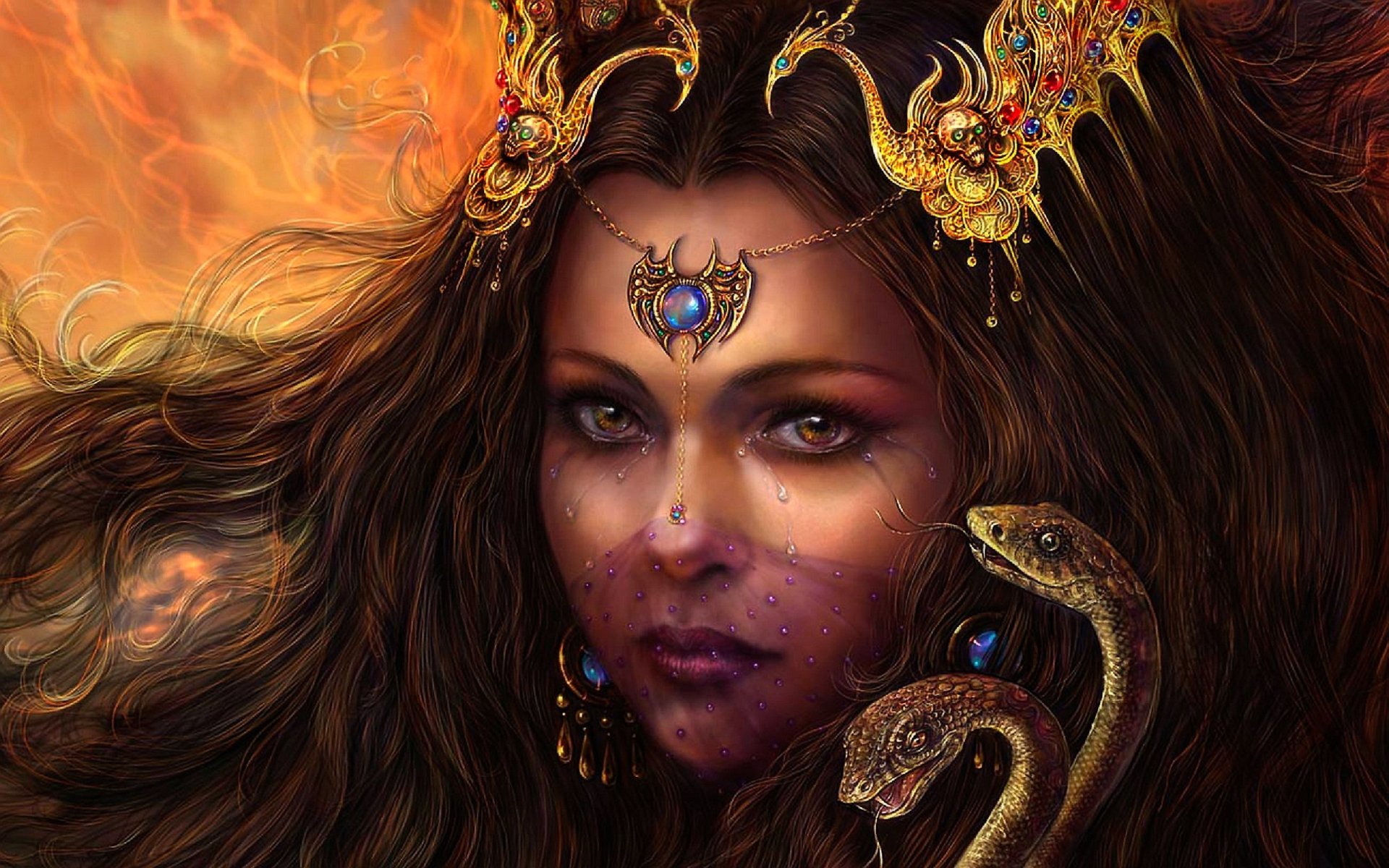 A captivating fantasy-themed HD desktop wallpaper featuring a woman with elaborate jewelry, deep green eyes, and snakes intertwining in her hair, set against a dramatic fiery background.