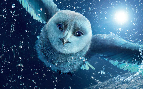 HD PC desktop wallpaper from the movie Legend of the Guardians: The Owls of Ga'Hoole, featuring a detailed owl soaring through a moonlit, snowy night.