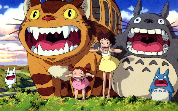 A vibrant HD wallpaper featuring Satsuki and Mei Kusakabe alongside Totoro, Mini Totoro, and the Catbus from *My Neighbor Totoro*, set against a picturesque landscape.