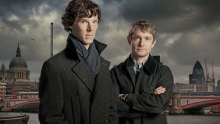 Sherlock Holmes and Dr. John Watson stand together against a dramatic London skyline, captured from the acclaimed TV show Sherlock. A striking HD desktop wallpaper.