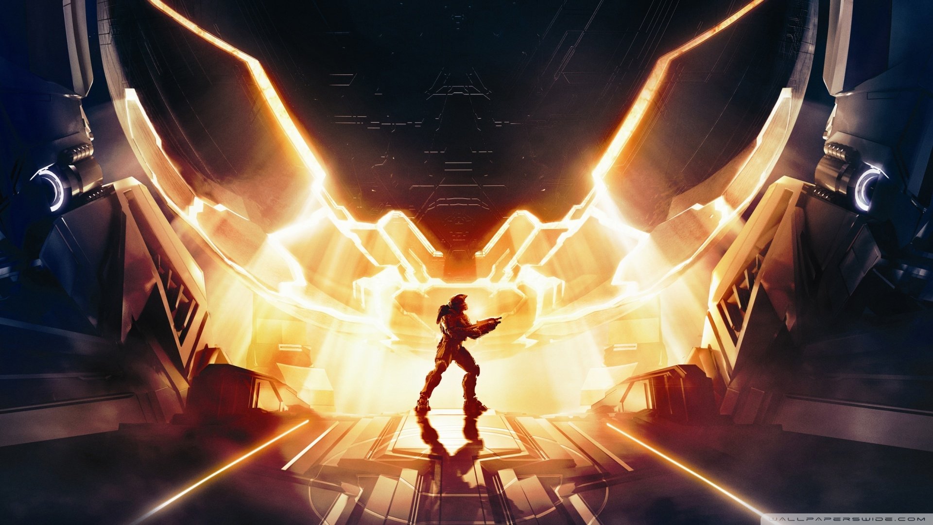 HD PC desktop wallpaper featuring a dynamic scene from the video game Halo 4, showcasing a lone armored figure illuminated by intense golden light beams inside a futuristic setting.