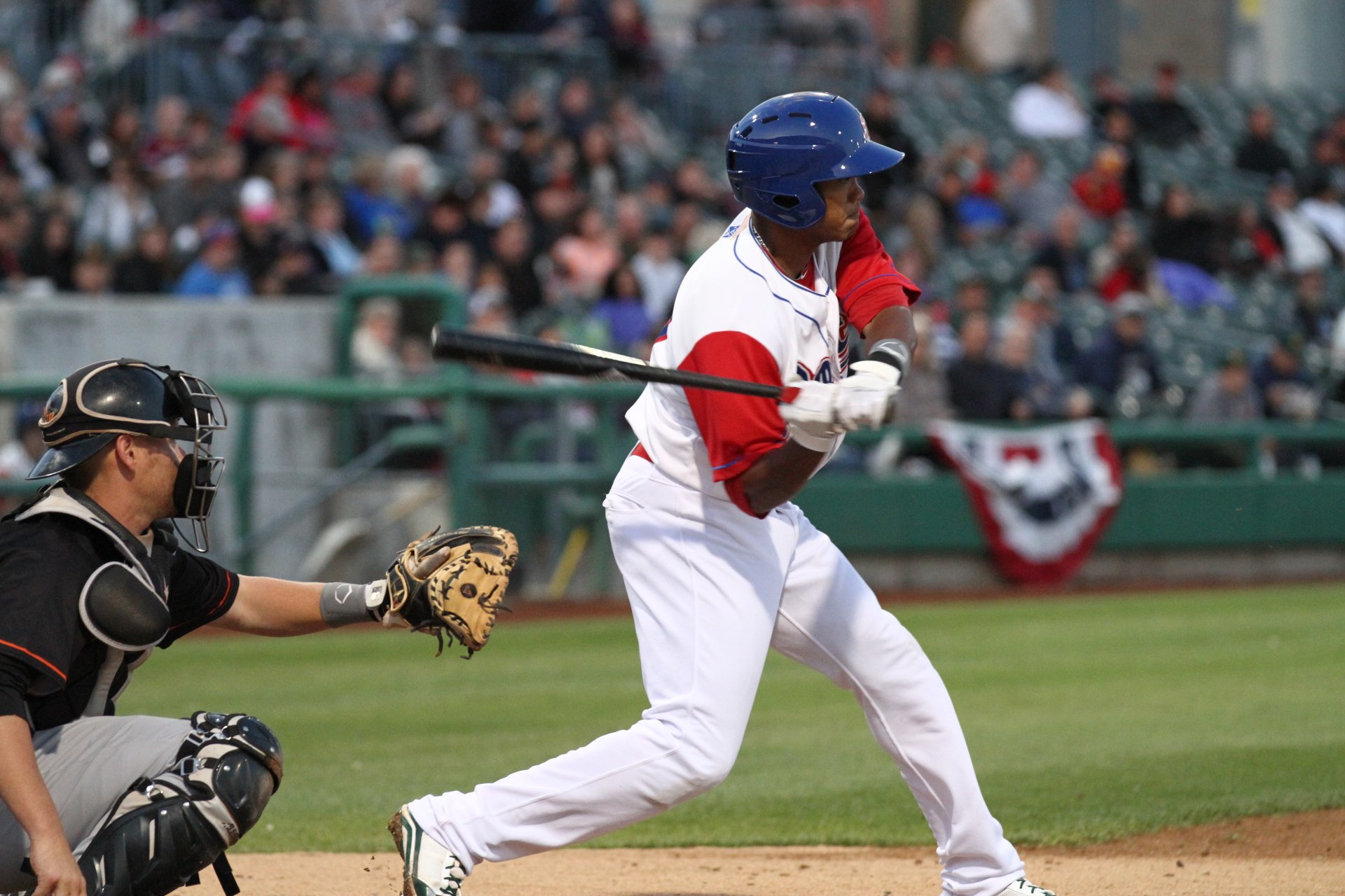 HD desktop wallpaper featuring Addison Russell in mid-swing at a baseball game with a catcher behind him.