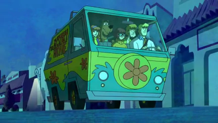 HD desktop wallpaper featuring the Mystery Machine with Scooby-Doo and the gang from the video game Scooby-Doo! Night of 100 Frights in a vibrant nighttime setting.