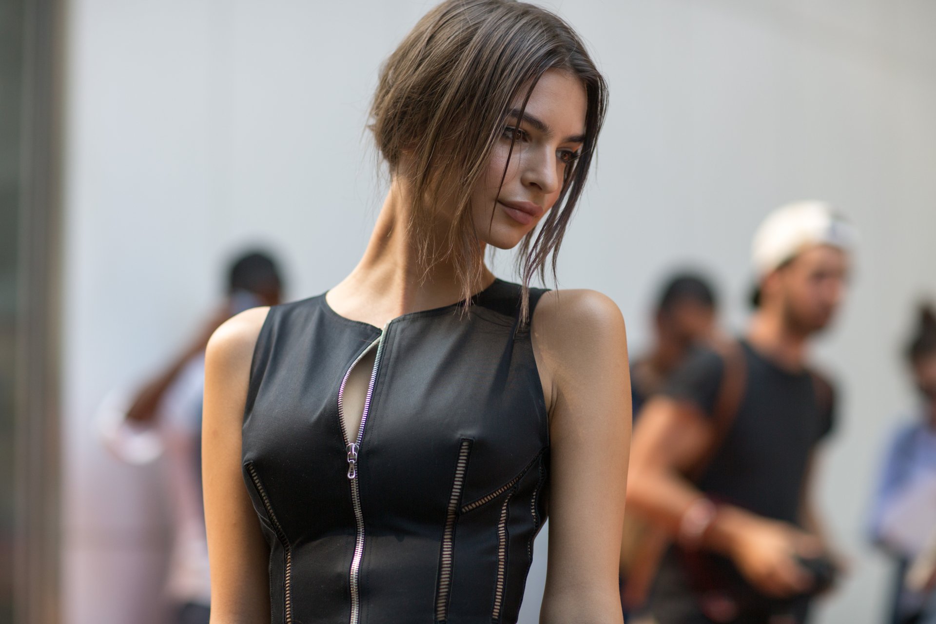 Emily Ratajkowski in a sleek black outfit, captured in a high-resolution 4K Ultra HD image, suitable as a PC desktop wallpaper background.