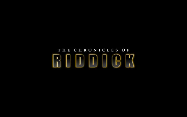 HD PC desktop wallpaper featuring the title logo of the movie The Chronicles of Riddick on a black background.