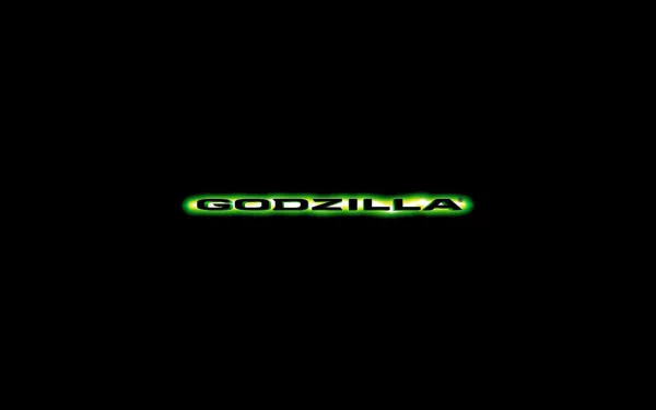 HD PC desktop wallpaper featuring the glowing green Godzilla logo from the 1998 movie against a black background.
