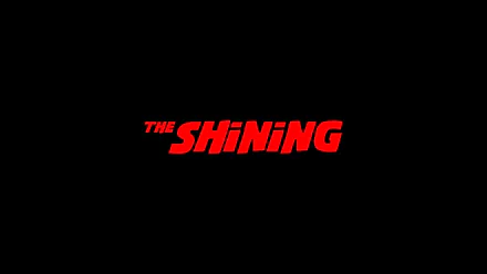 HD PC desktop wallpaper with a black background and a centered bold red THE SHINING movie logo.