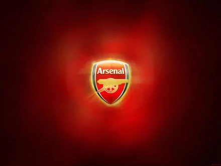 HD PC desktop wallpaper featuring the Arsenal F.C. logo glowing against a vibrant red sports-themed background.