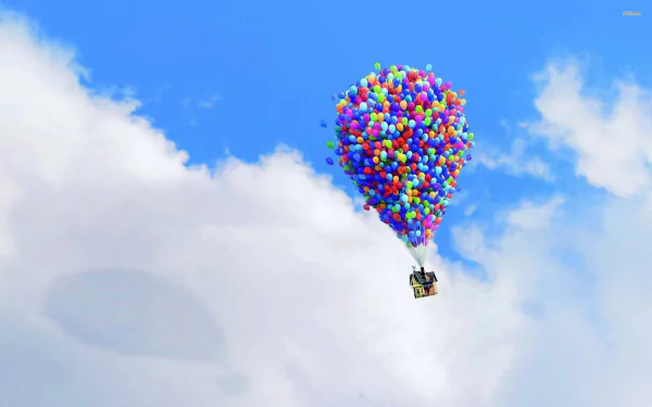 A vibrant HD desktop wallpaper featuring a colorful cluster of balloons lifting a small house into a bright blue sky, inspired by the movie Up.