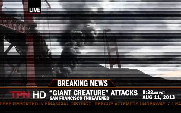 HD PC desktop wallpaper featuring a dramatic scene from the 2014 Godzilla movie with smoke and city destruction under breaking news coverage.