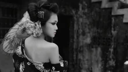 HD PC desktop wallpaper: black-and-white profile of a geisha woman in an ornate kimono with hair ornaments and a parasol against a textured wall background.