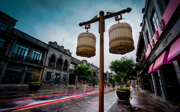 A captivating view of a traditional street in Beijing, featuring ornate hanging lanterns and historic architecture, capturing the essence of China's rich culture in vibrant HD.