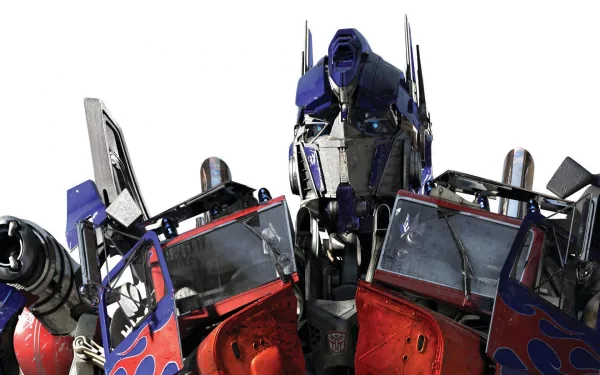 HD wallpaper of Optimus Prime from the Transformers movie, featuring a detailed close-up of the iconic robot with a commanding presence against a white background.