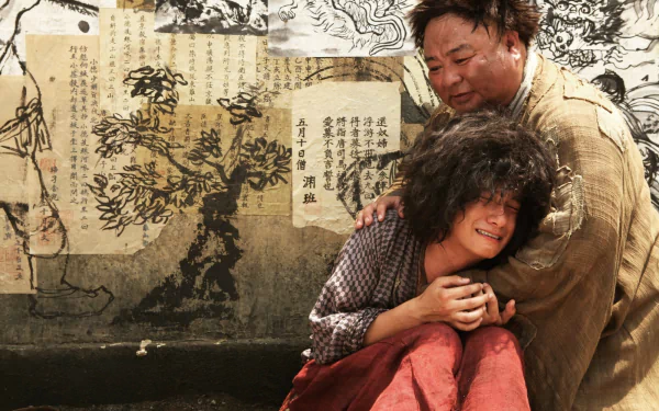 HD wallpaper of Journey To The West theme, featuring two characters embracing against a backdrop of traditional Chinese artwork.