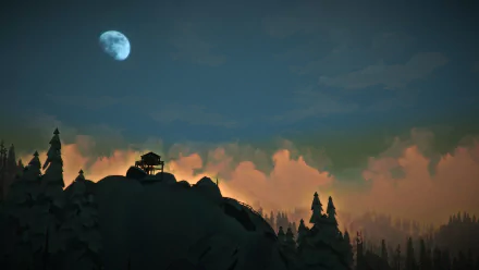 A stunning HD wallpaper from the video game The Long Dark, featuring a solitary cabin atop a mountain under a night sky illuminated by a bright moon and soft clouds.