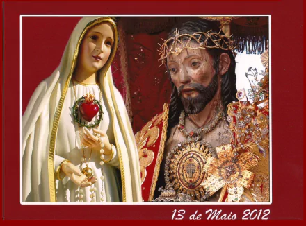 HD religious wallpaper featuring statues of Jesus and the Virgin Mary, beautifully detailed with vibrant colors and ornate decorations.
