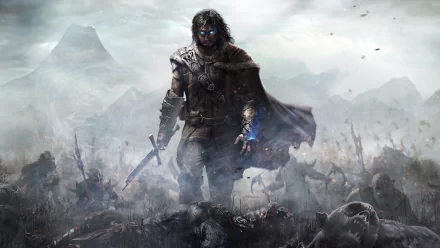 HD desktop wallpaper from Middle-earth: Shadow of Mordor featuring the central character standing triumphantly on a battlefield.