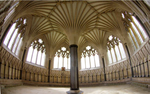 HD desktop wallpaper showcasing the intricate fan-vaulted ceiling and stained glass windows of the religious Wells Cathedral chapter house interior.