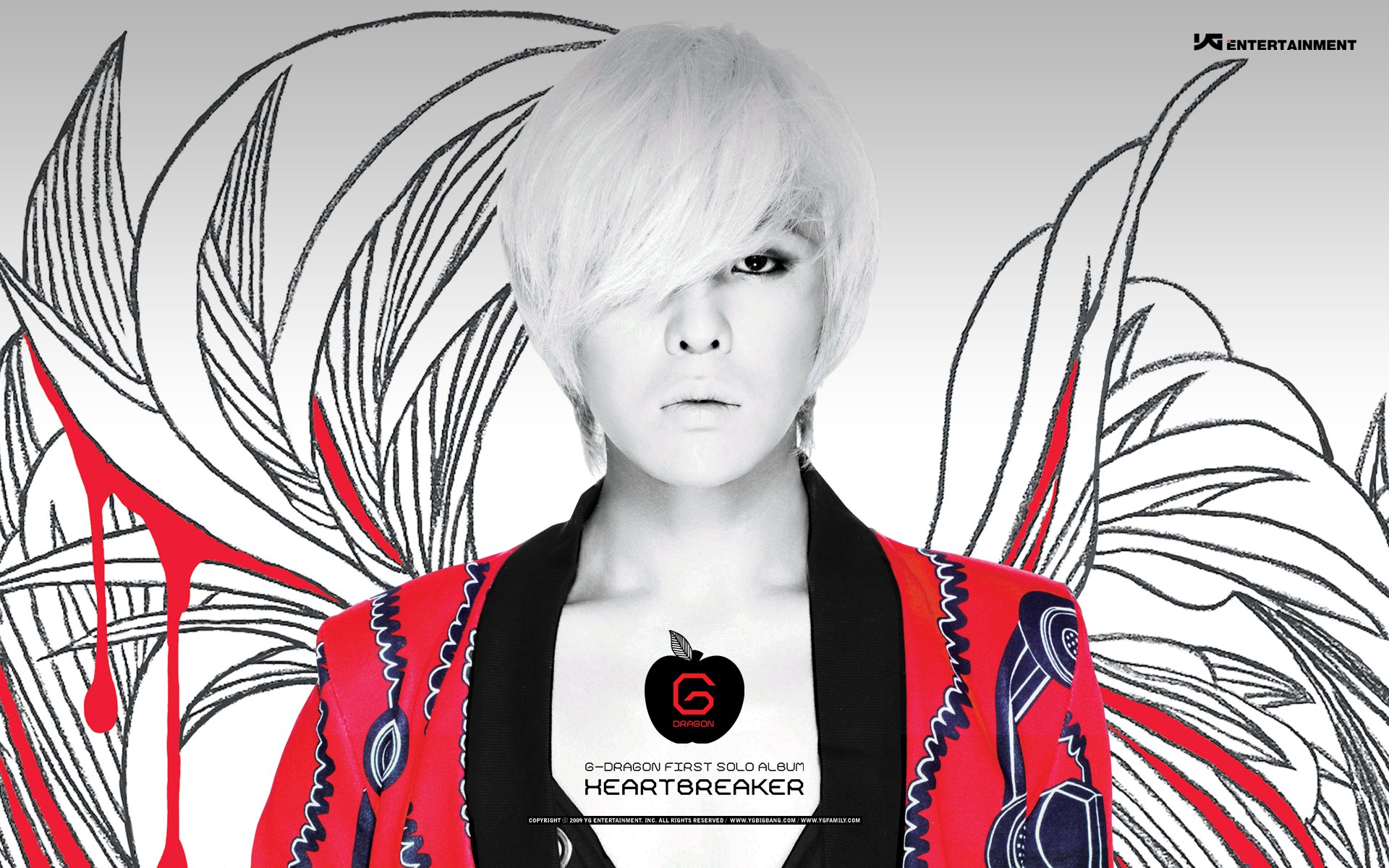 An HD desktop wallpaper featuring a striking image of a member of Bigbang, showcasing a bold design with vibrant colors and a dramatic background.