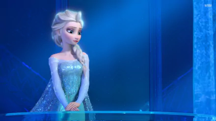 HD desktop wallpaper featuring Elsa from the movie Frozen, showcasing her in a shimmering blue gown against a frosty, icy background.