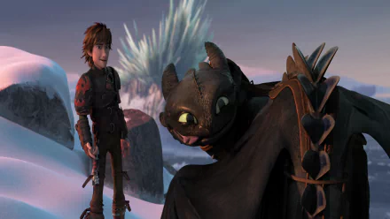 Hiccup and Toothless from How to Train Your Dragon 2 share a moment against a snowy background in this HD desktop wallpaper.