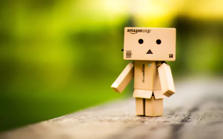 Cardboard Danbo toy standing on a wooden surface against a soft green bokeh — HD PC desktop wallpaper and background, Misc, danbo.