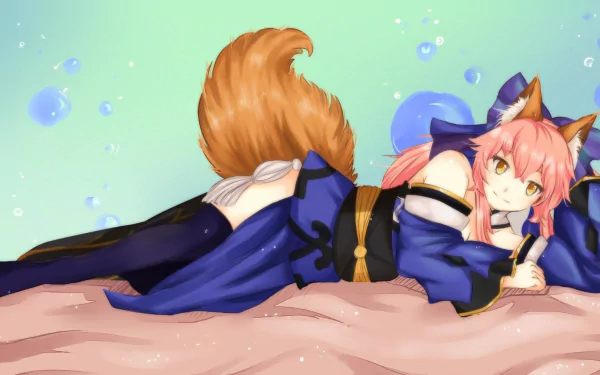 Anime character Caster from Fate/Extra lies gracefully in a kimono, adorned with thigh highs, animal ears, and a tail, smiling against a soft, bubbly background. HD desktop wallpaper.