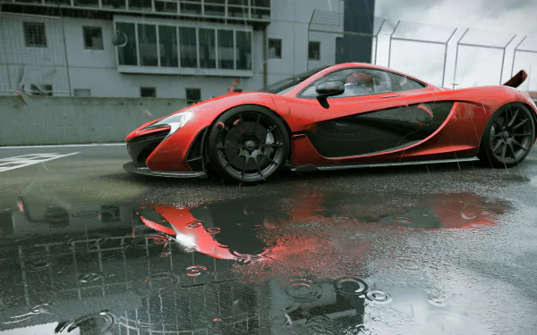 A high-definition wallpaper featuring a sleek red sports car from Project Cars, reflecting in rain-soaked pavement, set against a modern racing environment.