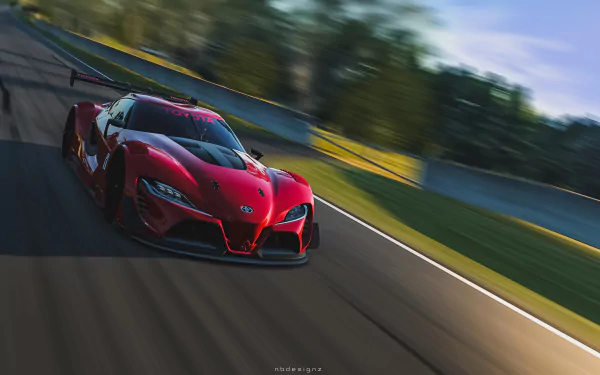 Video game Gran Turismo 6 4K Ultra HD PC desktop wallpaper and background: red race car tearing around a sunlit track with dramatic motion blur.